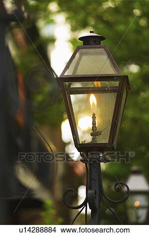 Picture - USA, South Carolina, Charleston, Close up of gas street lamp. Fotosearch