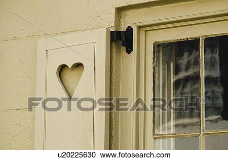 Stock Image - USA, South Carolina, Charleston, Close up of window shutter in old town. Fotosearch