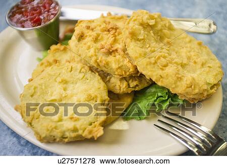 USA, South Carolina, Charleston, Close up fried green tomatoes on plate View Large Photo Image Stock Photo - USA, South Carolina, Charleston, Close up fried green tomatoes on plate. Fotosearch