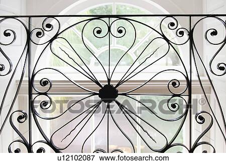 Stock Photo - USA, South Carolina, Charleston, Detail of ornate iron balustrade. Fotosearch