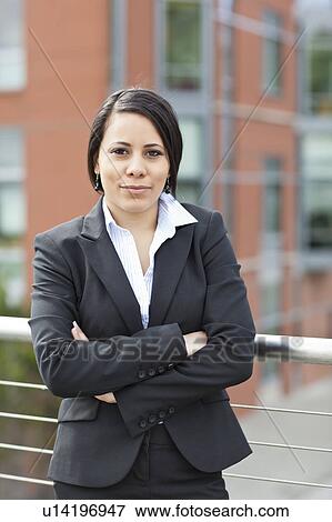 Stock Photo - USA, Washington, Seattle, Portrait of young businesswoman. Fotosearch