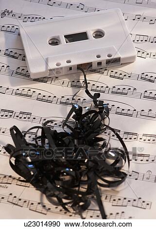 White mix tape on sheet music, studio shot View Large Photo Image Stock Image - White mix tape on sheet music, studio shot. Fotosearch