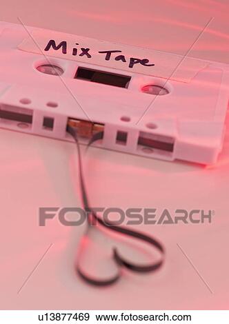 Stock Photo - White mix tape with heart shape, studio shot. Fotosearch