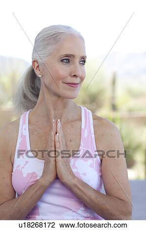 Stock Image - Woman doing yoga. Fotosearch