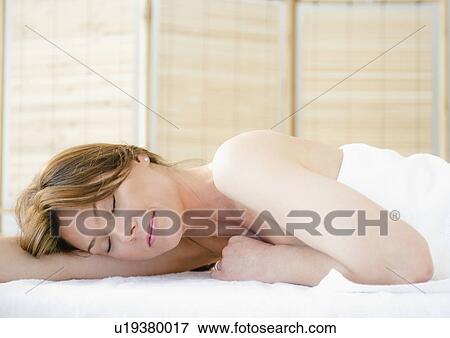 Stock Photo - Woman resting in spa. Fotosearch