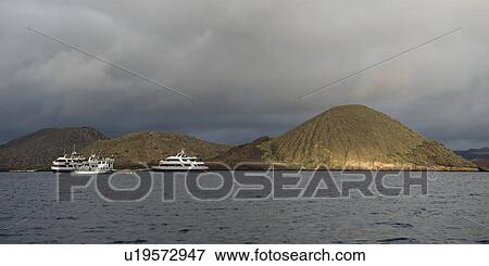 Boats in the Pacific Ocean, Bartolome Island, Galapagos Islands, Ecuador View Large Photo Image Stock Photo - Boats in the Pacific Ocean, Bartolome Island, Galapagos Islands, Ecuador. Fotosearch