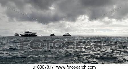 Boats in the Pacific Ocean, Playa Ochoa, San Cristobal Island, Galapagos Islands, Ecuador View Large Photo Image Stock Photo - Boats in the Pacific Ocean, Playa Ochoa, San Cristobal Island, Galapagos Islands, Ecuador. Fotosearch