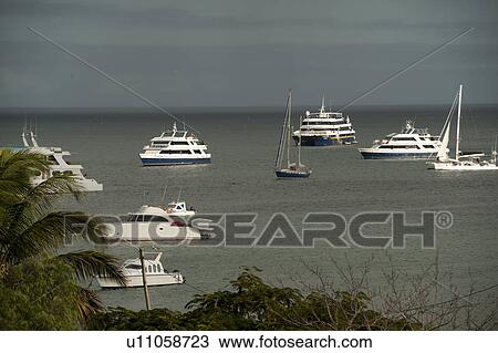 Boats in the Pacific Ocean, Puerto Baquerizo Moreno, San Cristobal Island, Galapagos Islands, Ecuador View Large Photo Image Stock Image - Boats in the Pacific Ocean, Puerto Baquerizo Moreno, San Cristobal Island, Galapagos Islands, Ecuador. Fotosearch