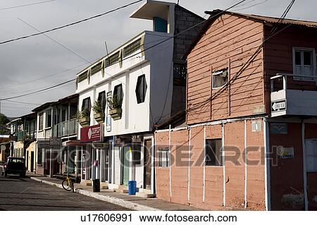Stock Image - Buildings along a street, Puerto Baquerizo Moreno, San Cristobal Island, Galapagos Islands, Ecuador. Fotosearch