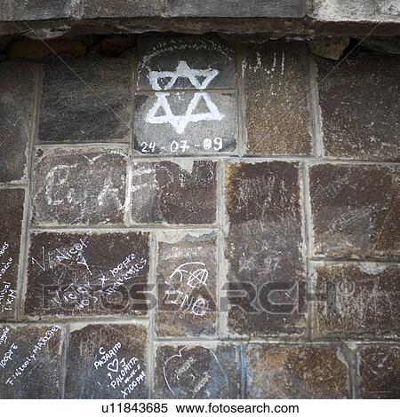 Close-up of a vandalized stone wall, El Panecillo Hill, Quito, Ecuador View Large Photo Image Stock Photography - Close-up of a vandalized stone wall, El Panecillo Hill, Quito, Ecuador. Fotosearch