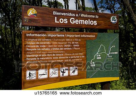 Stock Photography - Close-up of an information board at tourist spot, Los Gemelos, Santa Cruz Island, Galapagos Islands, Ecuador. Fotosearch