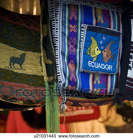 Stock Image - Ecuadorean textiles at a market, Quito, Ecuador. Fotosearch