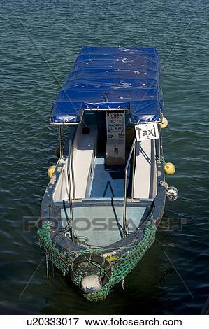 High angle view of a water taxi, Santa Cruz Island, Galapagos Islands, Ecuador View Large Photo Image Stock Photo - High angle view of a water taxi, Santa Cruz Island, Galapagos Islands, Ecuador. Fotosearch