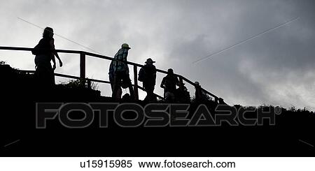 Stock Photography - Hikers, Bartolome Island, Galapagos Islands, Ecuador, South America, Latin America. Fotosearch