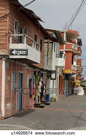 Picture - Houses along a street, Puerto Baquerizo Moreno, San Cristobal Island, Galapagos Islands, Ecuador. Fotosearch