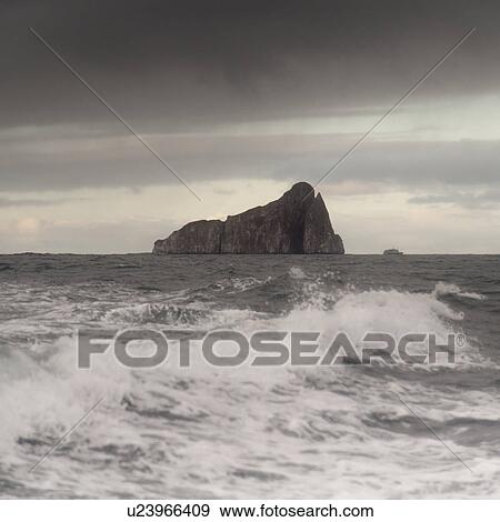 Pacific Ocean with Kicker Rock in the background, San Cristobal Island, Galapagos Islands, Ecuador View Large Photo Image Stock Photo - Pacific Ocean with Kicker Rock in the background, San Cristobal Island, Galapagos Islands, Ecuador. Fotosearch