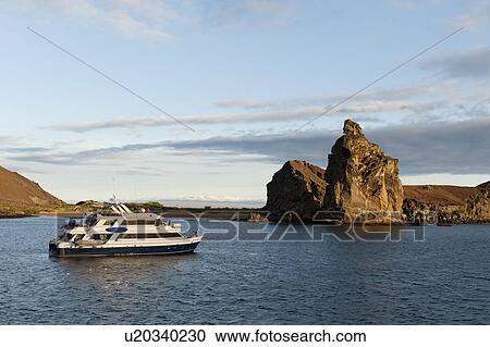 Pinnacle Rock, Bartolome island, Galapagos Islands, Ecuador View Large Photo Image Stock Image - Pinnacle Rock, Bartolome island, Galapagos Islands, Ecuador. Fotosearch