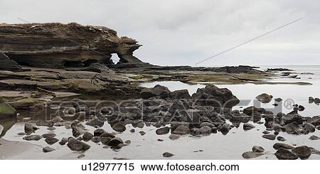 Stock Photography - Rock formation on the coast, Puerto Egas, Santiago Island, Galapagos Islands, Ecuador. Fotosearch