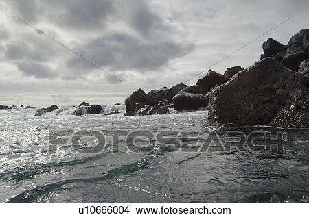 Rock formations on the coast, Playa Ochoa, San Cristobal Island, Galapagos Islands, Ecuador View Large Photo Image Picture - Rock formations on the coast, Playa Ochoa, San Cristobal Island, Galapagos Islands, Ecuador. Fotosearch