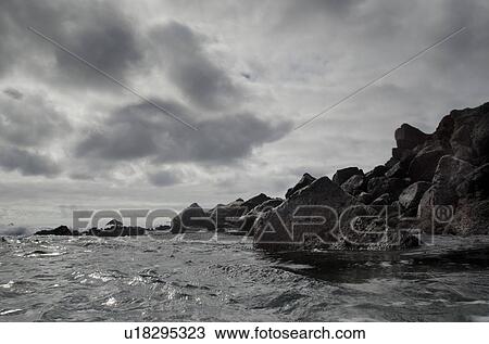 Rock formations on the coast, Playa Ochoa, San Cristobal Island, Galapagos Islands, Ecuador View Large Photo Image Stock Image - Rock formations on the coast, Playa Ochoa, San Cristobal Island, Galapagos Islands, Ecuador. Fotosearch