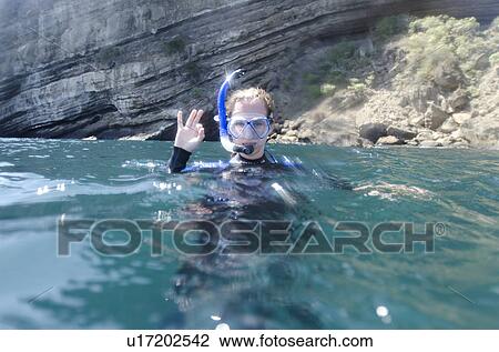 Scuba diver making Ok sign, Tagus Cove, Isabela Island, Galapagos Islands, Ecuador View Large Photo Image Stock Image - Scuba diver making Ok sign, Tagus Cove, Isabela Island, Galapagos Islands, Ecuador. Fotosearch