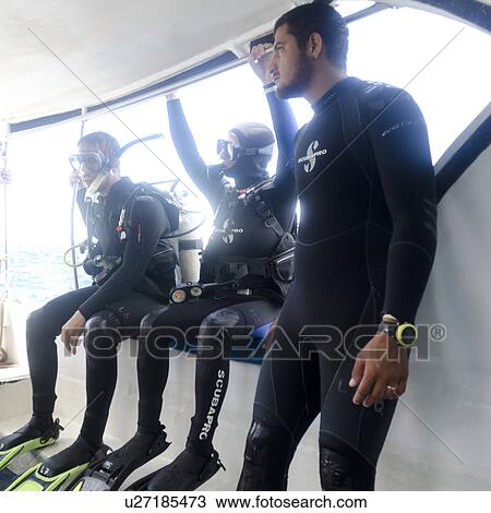 Scuba divers on a boat, Santa Cruz Island, Galapagos Islands, Ecuador View Large Photo Image Stock Image - Scuba divers on a boat, Santa Cruz Island, Galapagos Islands, Ecuador. Fotosearch