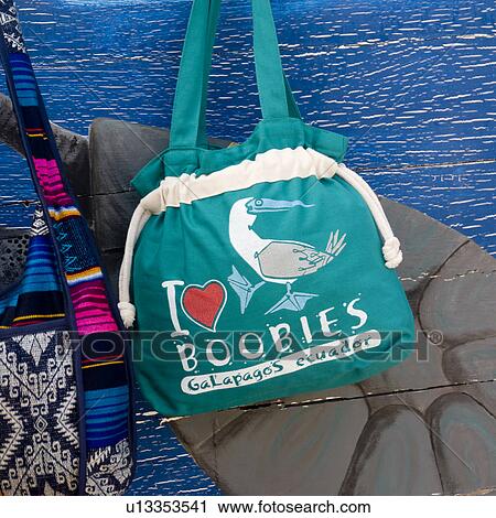 Souvenir bags at market stall, Puerto Baquerizo Moreno, San Cristobal Island, Galapagos Islands, Ecuador View Large Photo Image Stock Image - Souvenir bags at market stall, Puerto Baquerizo Moreno, San Cristobal Island, Galapagos Islands, Ecuador. Fotosearch