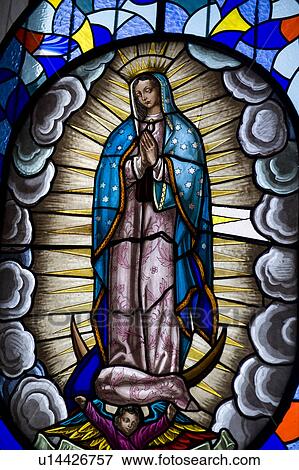 Stock Photo - Stained glass window of Virgin Mary, Virgin Mary Of Quito, Panecillo Hill, Quito, Ecuador. Fotosearch