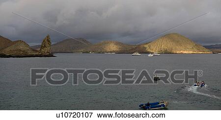 Tourists in the boats in the Pacific Ocean, Bartolome Island, Galapagos Islands, Ecuador View Large Photo Image Stock Photo - Tourists in the boats in the Pacific Ocean, Bartolome Island, Galapagos Islands, Ecuador. Fotosearch
