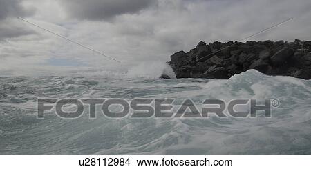 Waves breaking on the coast, Playa Ochoa, San Cristobal Island, Galapagos Islands, Ecuador View Large Photo Image Picture - Waves breaking on the coast, Playa Ochoa, San Cristobal Island, Galapagos Islands, Ecuador. Fotosearch