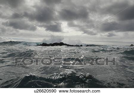 Waves breaking on the coast, Playa Ochoa, San Cristobal Island, Galapagos Islands, Ecuador View Large Photo Image Stock Image - Waves breaking on the coast, Playa Ochoa, San Cristobal Island, Galapagos Islands, Ecuador. Fotosearch