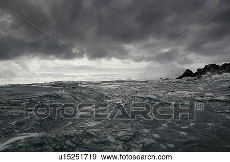 Waves breaking on the coast, Playa Ochoa, San Cristobal Island, Galapagos Islands, Ecuador View Large Photo Image Stock Photo - Waves breaking on the coast, Playa Ochoa, San Cristobal Island, Galapagos Islands, Ecuador. Fotosearch