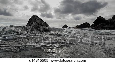 Stock Photography - Waves breaking on the coast, Playa Ochoa, San Cristobal Island, Galapagos Islands, Ecuador. Fotosearch