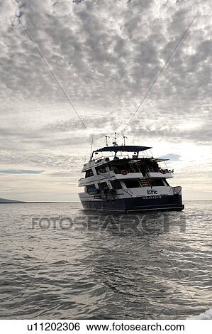 Yacht in the Pacific Ocean, Isabela Island, Galapagos Islands, Ecuador View Large Photo Image Stock Photograph - Yacht in the Pacific Ocean, Isabela Island, Galapagos Islands, Ecuador. Fotosearch