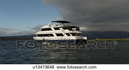 Yacht in the Pacific Ocean, Punta Espinoza, Fernandina Island, Galapagos Islands, Ecuador View Large Photo Image Stock Photo - Yacht in the Pacific Ocean, Punta Espinoza, Fernandina Island, Galapagos Islands, Ecuador. Fotosearch