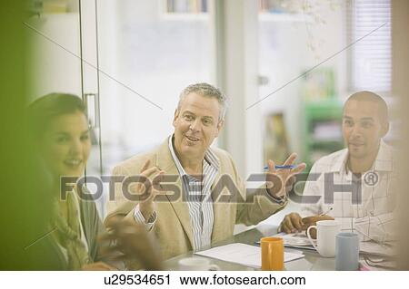 Business people talking in conference View Large Photo Image Stock Image - Business people talking in conference. Fotosearch