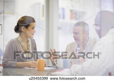 Business people talking in conference View Large Photo Image Stock Photo - Business people talking in conference. Fotosearch