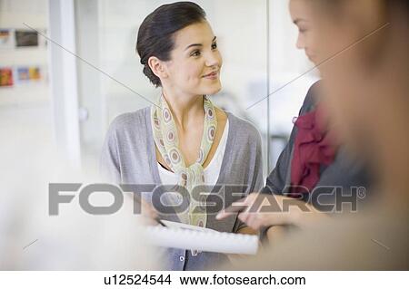 Business people talking in office View Large Photo Image Picture - Business people talking in office. Fotosearch