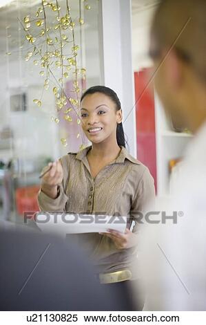 Business people talking in office View Large Photo Image Stock Photography - Business people talking in office. Fotosearch
