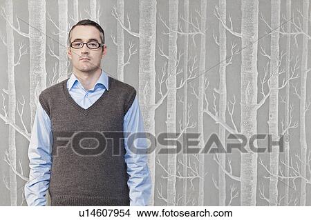 Picture - Businessman standing with tree pattern. Fotosearch