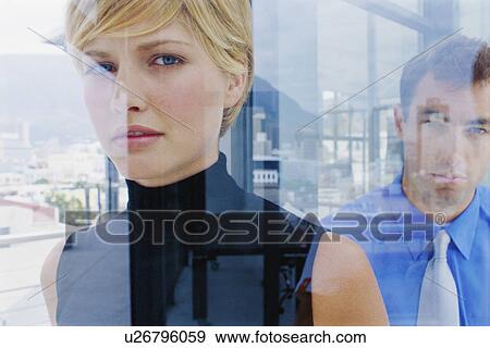 Businesspeople walking in office View Large Photo Image Stock Photo - Businesspeople walking in office. Fotosearch