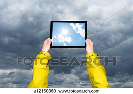Child viewing storm on tablet computer View Large Photo Image Stock Image - Child viewing storm on tablet computer . Fotosearch