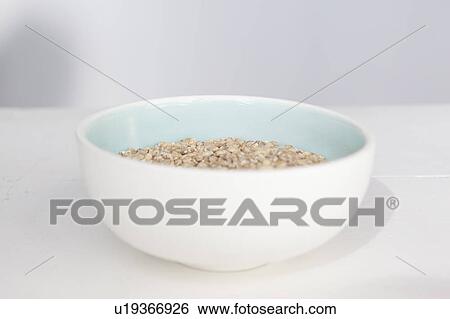 Close up of bowl of grains View Large Photo Image Stock Photograph - Close up of bowl of grains. Fotosearch