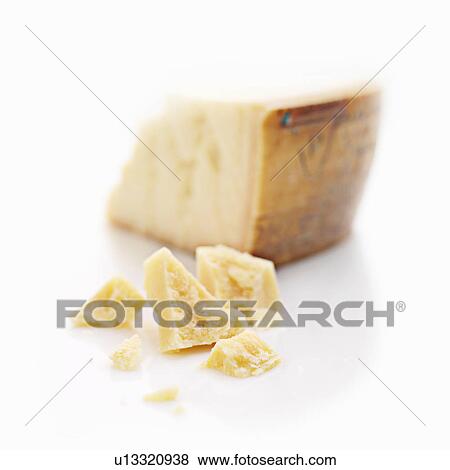 Stock Photo - Close up of chunks of cheese. Fotosearch
