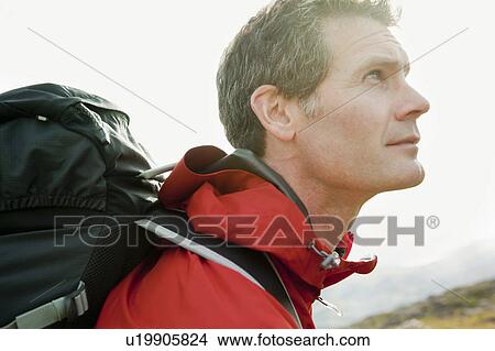 Picture - Close up of hiker’s face. Fotosearch