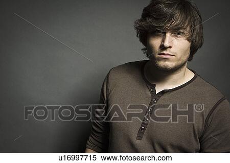 Stock Photography - Close up of man’s face. Fotosearch