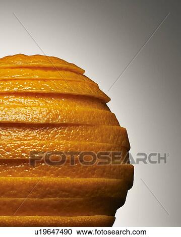 Stock Image - Close up of stack of orange slices. Fotosearch