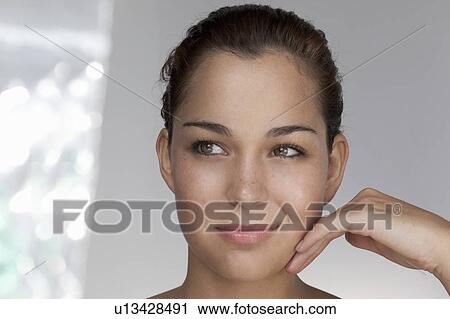 Close up of woman's smiling face View Large Photo Image Stock Image - Close up of woman's smiling face. Fotosearch