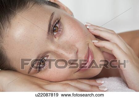 Close up of woman's smiling face View Large Photo Image Stock Photo - Close up of woman's smiling face. Fotosearch