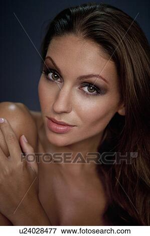 Stock Photo - Close up of woman's smiling face. Fotosearch